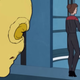 A yellow sex-lizard-man watches as Captain Janeway enters a Voyager elevator.